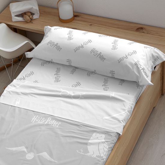 JUEGO DE SÁBANAS CON ALMOHADA Y BAJERA ESTAMPADAS 100% ALGODÓN MODELO HPOTTER UNIVERSE PARA CAMA DE 105. image 0