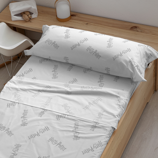 JUEGO DE SÁBANAS CON ALMOHADA Y BAJERA ESTAMPADAS 100% ALGODÓN MODELO HARRY POTTER PARA CAMA DE 90. image 0