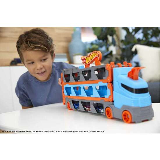 CAMION DE TRANSPORTE HOT WHEELS CONVERTIBLE EN PISTA DE COCHES. image 2